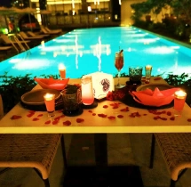 candlelight dinners Romantic Poolside Candlelight Dining at Hilton